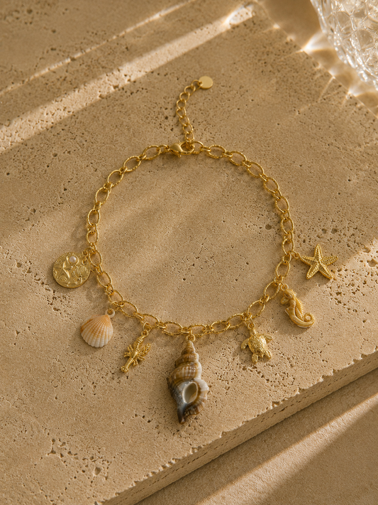 Collier charms océan doré – grosse maille avec coquillage, étoile de mer, tortue, hippocampe et crabe dorés, style marin – Bijoux Incandescence